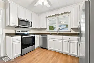 303 Cape Lookout Drive, Harkers Island, NC 28531 – photo 8: 30-web-or-mls-IMG_5755