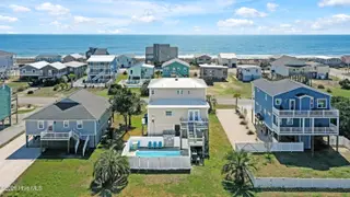 1018 W Dolphin Drive, Oak Island, NC 28465 – photo 1: 1018WestDolphinDriveDrone-4