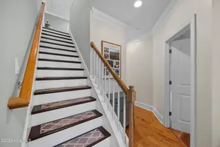 2216 Umstead Lane, Leland, NC 28451 — 3-bedroom home in Brunswick Forest, Leland, NC, photo 22 of 70: 23_stairs