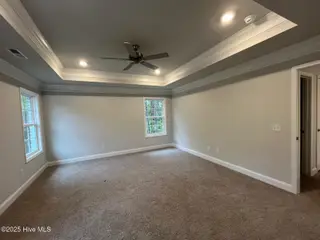 1221 Mandevilla Drive SE, Bolivia, NC 28422 – photo 22: Primary Suite
