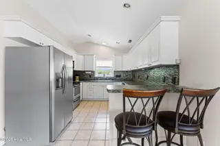 126 NE 5th Street, Oak Island, NC 28465 – photo 17: shniderproductions.com-11