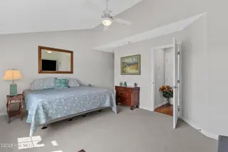 656 Settlers Lane, Kure Beach, NC 28449 – photo 22: Primary bed on Main