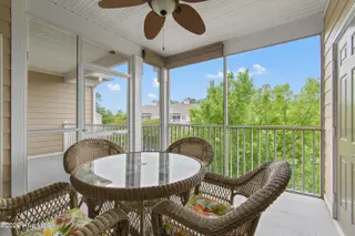 221 Woodlands Way Unit 21, Calabash, NC 28467 — 2-bedroom condo in Crow Creek, Calabash, NC, photo 24 of 39: Screened Porch