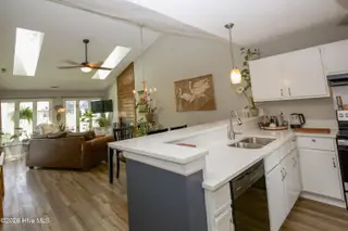 171 Cranes Cove, Vass, NC 28394 – photo 14: 10_Kitchen-Open-to-Living_171-Cranes-Cov