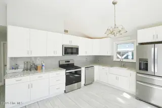 127 NW 10th Street, Oak Island, NC 28465 – photo 5: 127 NW 10th St Oak Island NC-large-008-0
