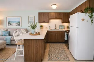 9201 Coast Guard Road F 210, Emerald Isle, NC 28594 – photo 11: Kitchen-staged