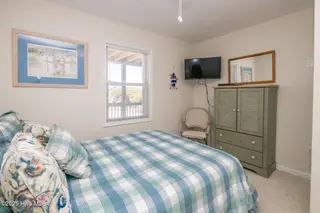 1131 S Shore Drive, Surf City, NC 28445 – photo 13: Poolside South Queen Bedroom II