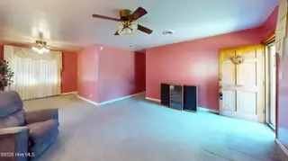 409 Henderson Drive, Jacksonville, NC 28540 – photo 8: 409-Henderson-Living-Room