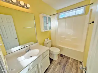 4901 N Hampton Drive SE, Southport, NC 28461 – photo 24: 4901 N Hampton SE guest Bath1