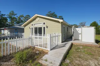 127 NW 10th Street, Oak Island, NC 28465 – photo 2: 127 NW 10th St Oak Island NC-large-005-0
