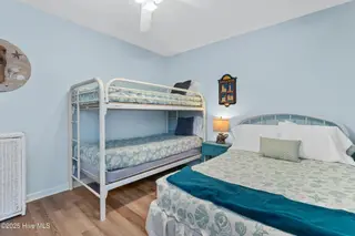 316 NE 52nd Street, Oak Island, NC 28465 – photo 21: 21_bedroom