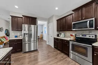94 Diamond Creek Drive, Clayton, NC 27520 – photo 8: 94 diamond creek kitchen 1