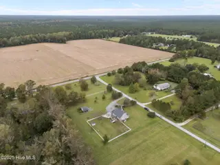 74 S Hummingbird Lane, Rocky Point, NC 28457 — 3-bedroom home in Highsmith Estates, Rocky Point, NC, photo 1 of 38: 25-web-or-mls-DJI_20251010124755_0610_D