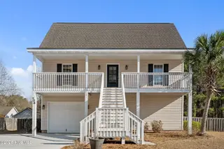 106 Dolphin Drive, Hampstead, NC 28443 — 3-bedroom home in Hideaway Shores, Hampstead, NC, photo 1 of 57