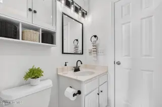 1125 S Topsail Drive, Surf City, NC 28445 – photo 14: Bathroom
