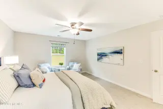 1316 N Fisher King Drive SE, Bolivia, NC 28422 — 3-bedroom home in Avalon, Bolivia, NC, photo 18 of 33: Primary Bedroom