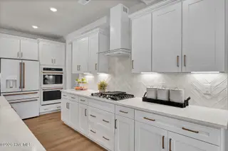 1313 Pandion Drive, Wilmington, NC 28411 — 5-bedroom home in Scotts Hill Village, Wilmington, NC, photo 11 of 21: Kitchen- NOT SUBJECT HOME SIMILAR PHOTO