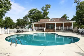 119 L 10 Cape Point Boulevard, Cape Carteret, NC 28584 – photo 13: Community Club House & Pool