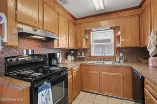 419 1st Street, Sunset Beach, NC 28468 – photo 11: 011_file_9739
