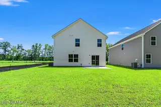 8035 Sterling Oak Drive NW, Ash, NC 28420 – photo 3: Backyard