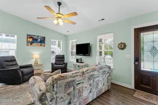 316 NE 52nd Street, Oak Island, NC 28465 – photo 16: 12_living room