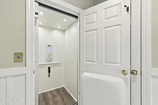 9936 Louise Howard Court East, Emerald Isle, NC 28594 — 3-bedroom townhome in Spinnakers Reach, Emerald Isle, NC, photo 11 of 32: Private Elevator