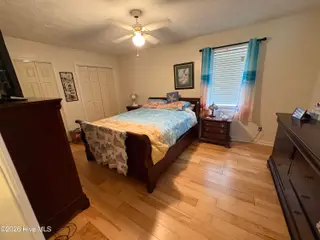 144 Waccamaw Shores Road, Lake Waccamaw, NC 28450 – photo 23: Bedroom 3