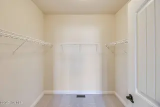 257 Eagle Claw Drive 4018, Carolina Shores, NC 28467 – photo 12: Bedrock - Owners Closet