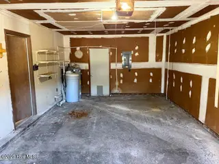 20 Chattawka Drive, Havelock, NC 28532 — 3-bedroom home in Greenfield Heights, Havelock, NC, photo 19 of 20: Attached Garage Interior View 2