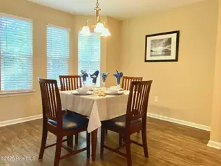 11 Court 11 Northwest Drive NW, Carolina Shores, NC 28467 — 3-bedroom home in Carolina Shores, Carolina Shores, NC, photo 8 of 28: 9-Dining Area