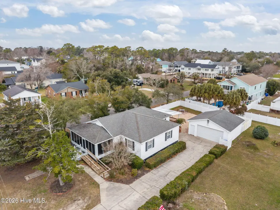 416 Spartanburg Avenue, Carolina Beach, NC 28428 – photo 1 of 52: 53-web-or-mls-DJI_20260114113842_0400_D