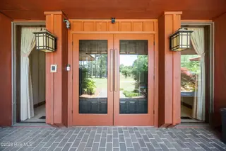 201 Country Club Drive, Elizabeth City, NC 27909 — 3-bedroom home in Country Club Forest, Elizabeth City, NC, photo 3 of 58: 057 ccd 260504 ext front entry