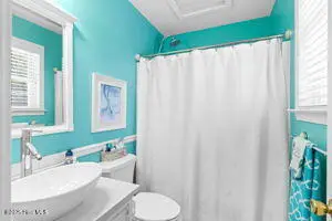 124 NE 15th Street, Oak Island, NC 28465 – photo 20: thumbnail-0196a7bd-010b-73b6-9a74-b738d9