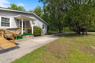 704 Canal Cove Road, Lake Waccamaw, NC 28450 – photo 9: Side Home Entry