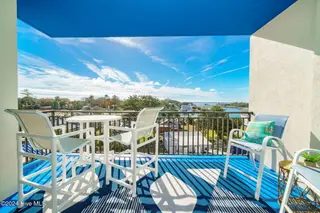 4425 Arendell Street 303 Harborside Club At 70 West, Morehead City, NC 28557 – photo 10: Covered porch w/ great water views