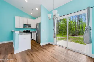 1858 E Boiling Spring Road, Southport, NC 28461 – photo 5: dining room kitchin combo