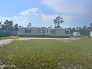 383 Woodside Drive, Hampstead, NC 28443 — 3-bedroom manufactured home in Creekside Estates, Hampstead, NC, photo 1 of 18: IMG_1759