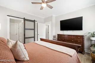 135 NE 75th Street, Oak Island, NC 28465 – photo 13: Master Bedroom