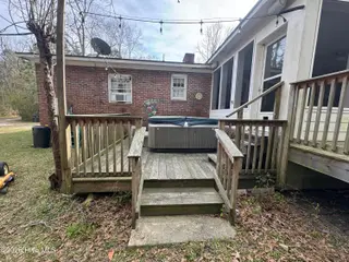 691 Harris Creek Road, Jacksonville, NC 28540 — 3-bedroom home, Jacksonville, NC, photo 8 of 41: rear lower deck