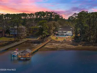 2502 W Yacht Drive, Oak Island, NC 28465 – photo 1: 4-web-or-mls-DJI_20260224131001_0616_D_2