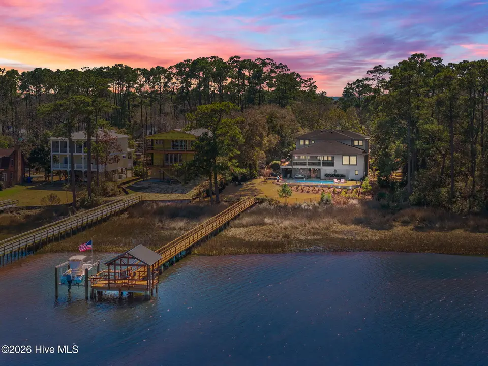 2502 W Yacht Drive, Oak Island, NC 28465 – photo 1 of 50: 4-web-or-mls-DJI_20260224131001_0616_D_2