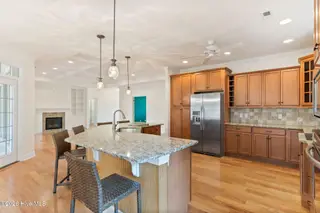 6308 Motts Village Road, Wilmington, NC 28412 – photo 13: 6308 Motts Village Rd kitchen to liv