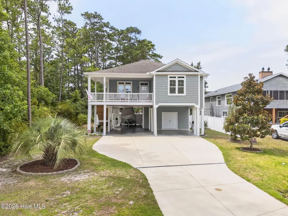 2303 W Yacht Drive, Oak Island, NC 28465 — 3-bedroom home, Oak Island, NC, photo 1 of 49