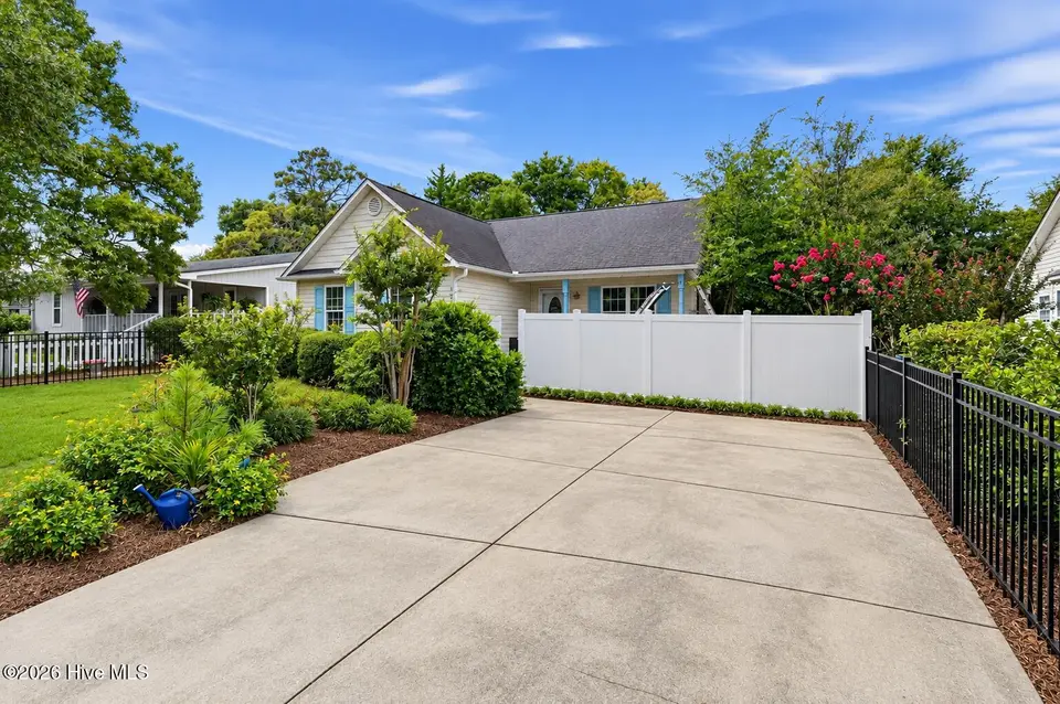 121 NE 6th Street, Oak Island, NC 28465 – photo 1 of 21: Driveway