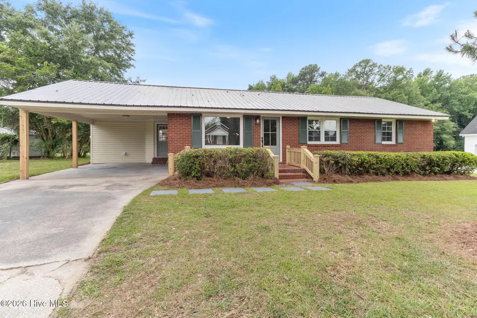 207 Sunset Avenue, Whiteville, NC 28472 – photo 1 of 55: Front Home View