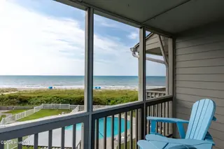 2111 W Fort Macon Road 313 Dunescape, Atlantic Beach, NC 28512 – photo 3: Deck overlooking pool and ocean