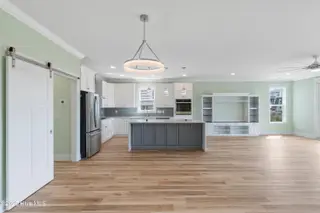 5515 E Pelican Drive, Oak Island, NC 28465 – photo 16: 5515EPelicanDr - 13 (1)