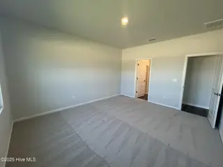 535 Coronado Avenue SE 64, Leland, NC 28451 – photo 19: Owner's Bedroom