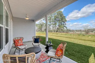 245 Mayflower Drive NW Lot 36, Calabash, NC 28467 – photo 18: Covered Porch 2 - Gwinett C - Allston Pa