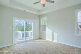 202 Broadleaf Drive, Jacksonville, NC 28546 – photo 17: Primary Bedroom with Porch access